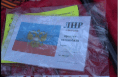 В гараже лисичанской сепаратистки найдены «отжатый» автомобиль, флаг РФ и тротиловая шашка